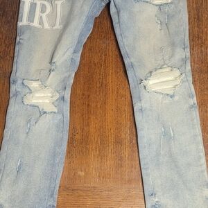 AMIRI Light Blue Distressed Skinny Jeans